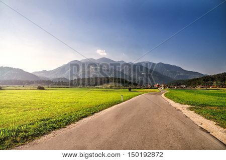 A road through the village. Alps. Slovenia