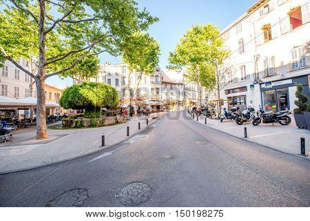 Salon-de-Provence, France - June 17, 2016: View on the central square with cafes, bars and famous old mossy fontain in Salon-de-Provence