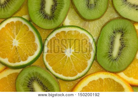 slices of kiw iorange and sweetie closeup
