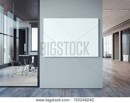 Empty white canvas on the modern office gray wall. 3d rendering