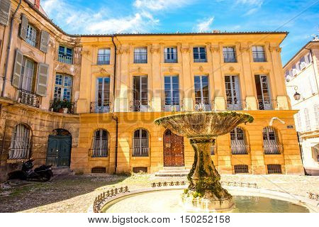 Beautiful old fountain on Albertas square in Aix-en-Provence old town in France. French architecture in Provence
