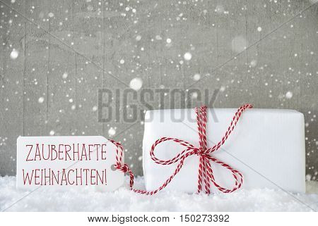 One Christmas Present On Snow. Cement Wall As Background With Snowflakes. Urban Style. Card For Birthday Or Seasons Greetings. Label With German Text Zauberhafte Weihnachten Means Magic Christmas