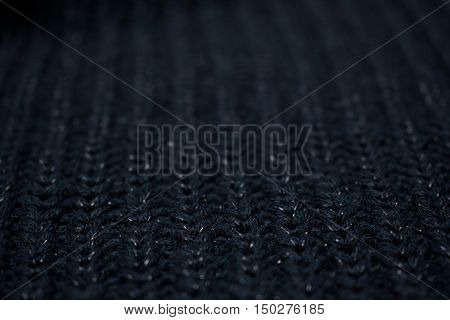 A black sweater close up textile product