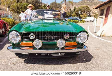 Laguna Beach, CA, USA - October 2, 2016: Green 1972 Triumph TR6 owned by Robert Myer and displayed at the Rotary Club of Laguna Beach 2016 Classic Car Show. Editorial use.