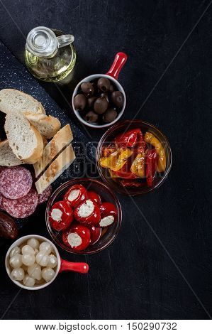 Spanish Tapas With Slices Jamon Serrano And Grilled Pepper. Also