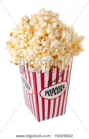 Kutu üzerine beyaz izole patlamış mısır ile dolu taşan. Tasarlanmış ve kendim oluşturmak.