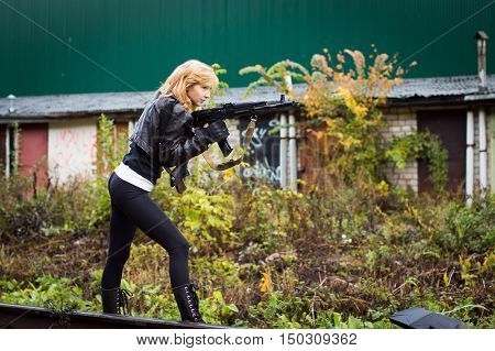 Nice Girl With Arms In Autumn Day
