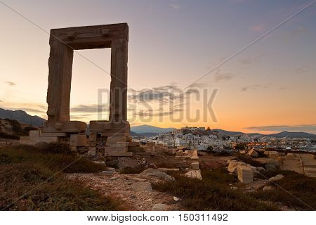 View of Portara and remains of temple of Apollo at sunrise.