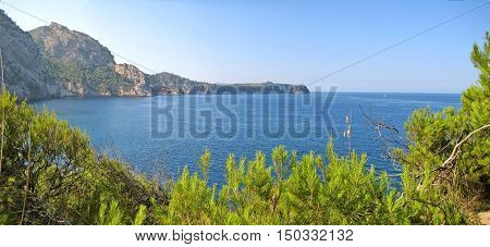 Bay Panorama With Blue Ocean, Green Nature And Mountains