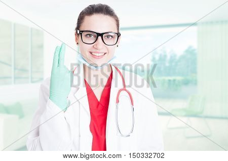 Gorgeous Doctor Showing Two Fingers