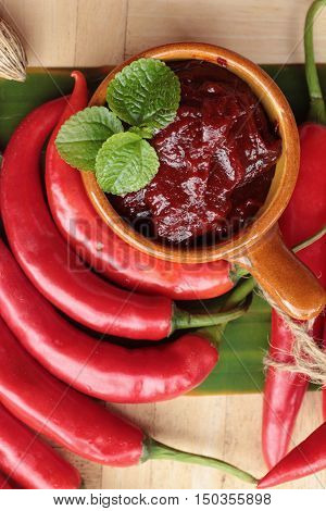 Korean red pepper gochujang for cooking on wood background