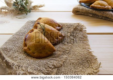 Closeup of typical spanish empanadillas small meat or tuna fried pies