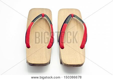 Geta Is A Traditional Footwear Of Japan.old Geta On White Background
