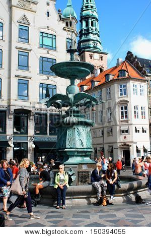 Copenhagen: aug 18. 2016 - Amagertorv central pedestrian area in Storkespringvandet Copenhagen Denmark