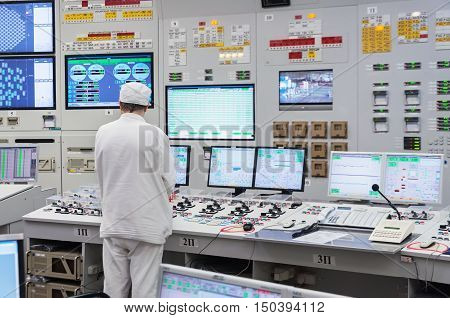 KURCHATOW, RUSSIA - JUNE 23, 2016: The operator monitors the readings of devices and work equipment. Central control unit of Kursk NPP.