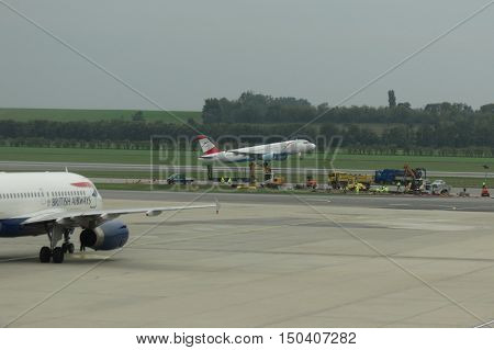 British Airways Aircraft On The Runway And Austrian Airlines Air