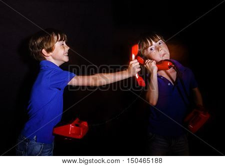Freckled Boy Speaking Old-style Red Phone, Double-exposition