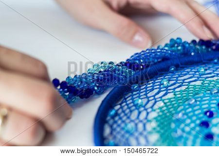 set for making a Dreamcatcher beads thread on a white background