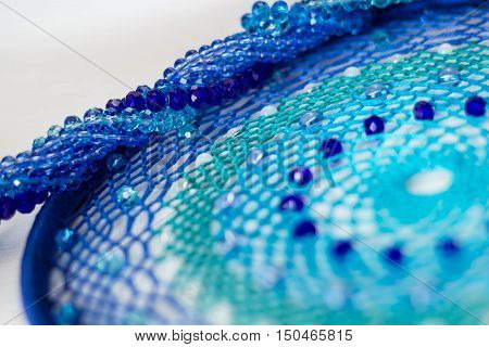 set for making a Dreamcatcher beads thread on a white background