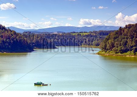 Pilchowice lake and Karkonosze mountains at sunny day , Poland