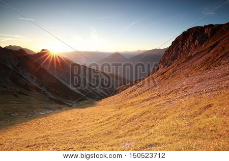 autunm sunrise over mountains in Alps Austria