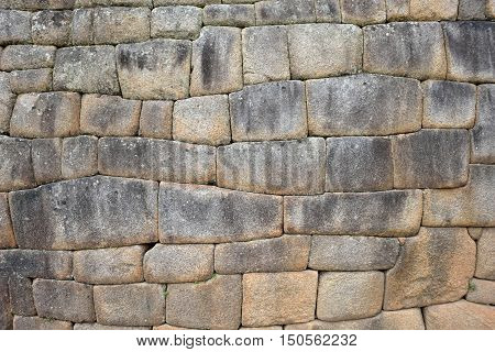 Inca wall in the village Machu-Picchu Peru South America