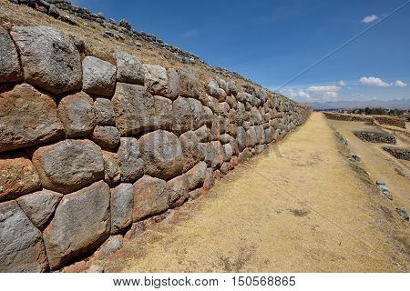 Inca wall in the village Chinchero Peru South America