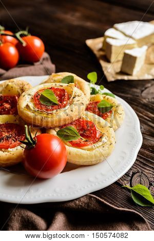 Mini Pizzas With Camembert And Tomato