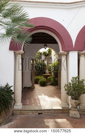 Entrance arch of a typical spanish andalusian patio in Roc de Sant Gaieta Tarragona Catalunya Spain.
