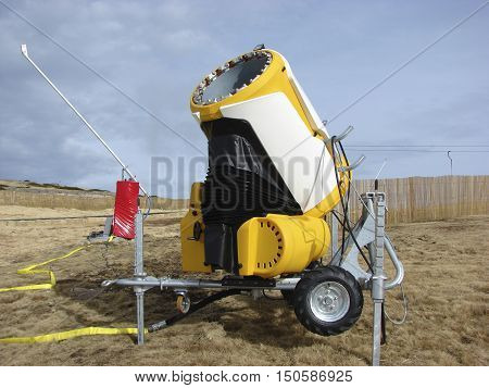 Artificial snow-making machine on a ski track