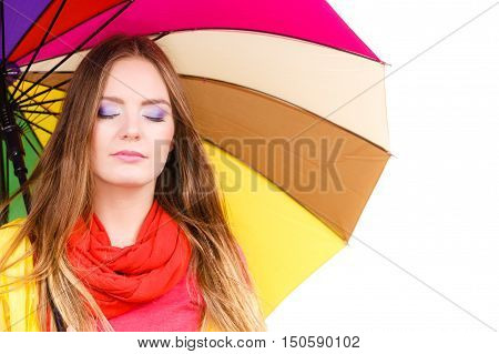 Woman In Rainproof Coat Under Umbrella
