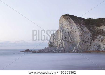 Serene seascape in Atxabiribil beach Biscay Basque Country Spain. Long exposure shot.