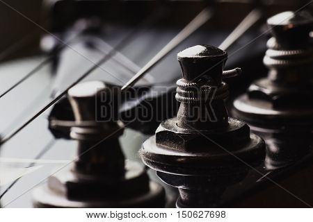 Electric guitar machine heads and strings close-up
