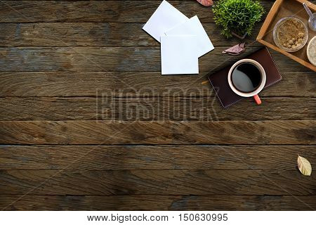 Home office desk table with Red cup copy spce for text or products display montage.