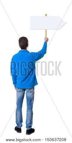 Back view man showing sign board. man holds information plate. Rear view people collection. backside view of person. Isolated over white background. The guy in the blue sweater holding a pointer.