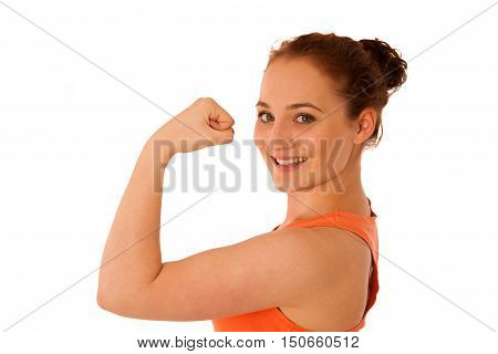 Woman showing her arm as a gesture for strrength isolated over white