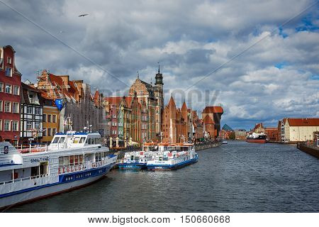 Gdansk Poland - October 04 2016: Old historic buildings of the old city on the Motlawa River waterfront in Gdansk