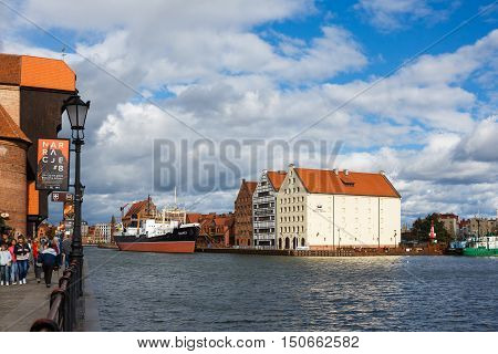 Gdansk Poland - October 04 2016: Old historic buildings of the old city on the Motlawa River waterfront in Gdansk
