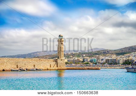 Rethymno old Venetian harbor with the Egyptian lighthouse, Crete island, Greece. It was built in 1830 by Egyptians.