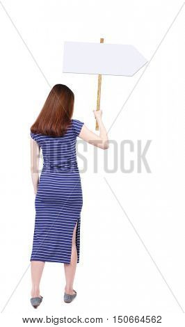 Back view woman showing sign board. man holds information plate. Rear view people collection. backside view of person. Isolated over white background. The brunette in a blue dress holding a pointer.