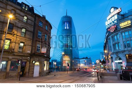 Manchester UK - September 23 2016: National Football museum and odean cinema area with car trails near the exchange square