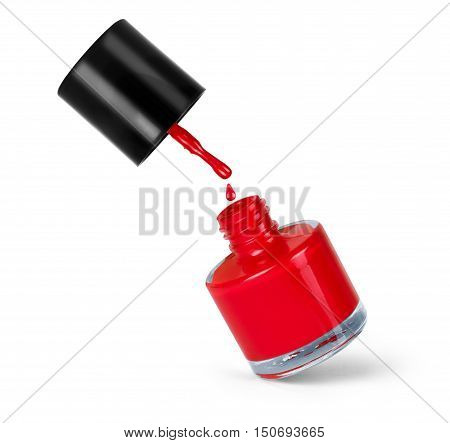 red nail polish bottle with splash isolated on white