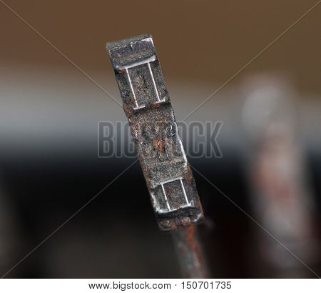 picture of a closeup of old disrty and dusty typewriter buttons