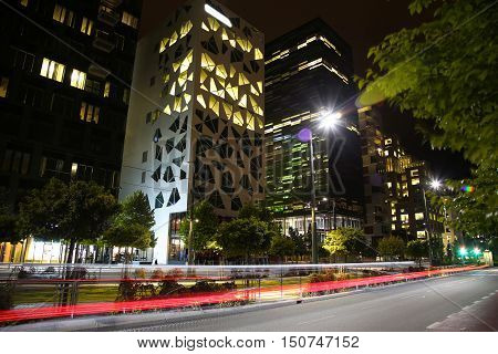 moving car with blur light through Dronning Eufemias gate street in Oslo at night