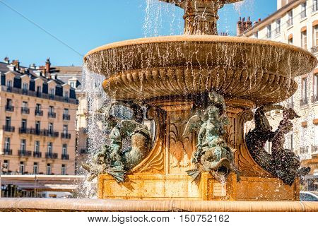 Grenoble old city fountain on Place Grenette on the south-east of France