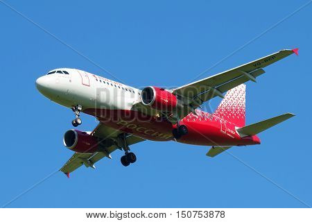 SAINT PETERSBURG, RUSSIA - AUGUST 24, 2016: Airbus A319-111 (VQ-BCP) of the airline Rossiya - Russian Airlines largest plan in the blue sky