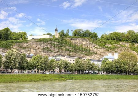 SALZBURG AUSTRIA - May 05.2012: Salz River Beach. The museum building on top of a cliff