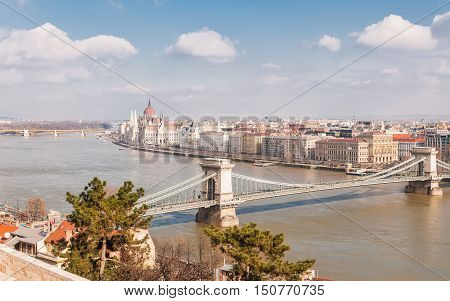 Panoramic overview of Budapest on foreground the Parliament building and chain bridge Hungary