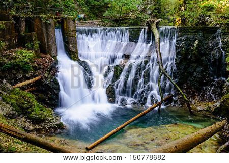 Waterfall at the Vintgar gorge, beauty of nature, with river Radovna flowing through, near Bled, Slovenia.