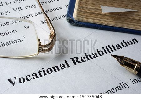 Vocational Rehabilitation written on a paper and a book.
